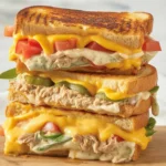 Delicious tuna melt sandwich with melted cheese and crispy bread.