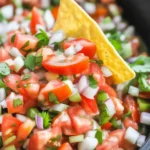 Authentic pico de gallo made with fresh ingredients like tomatoes, onions, and jalapeños.