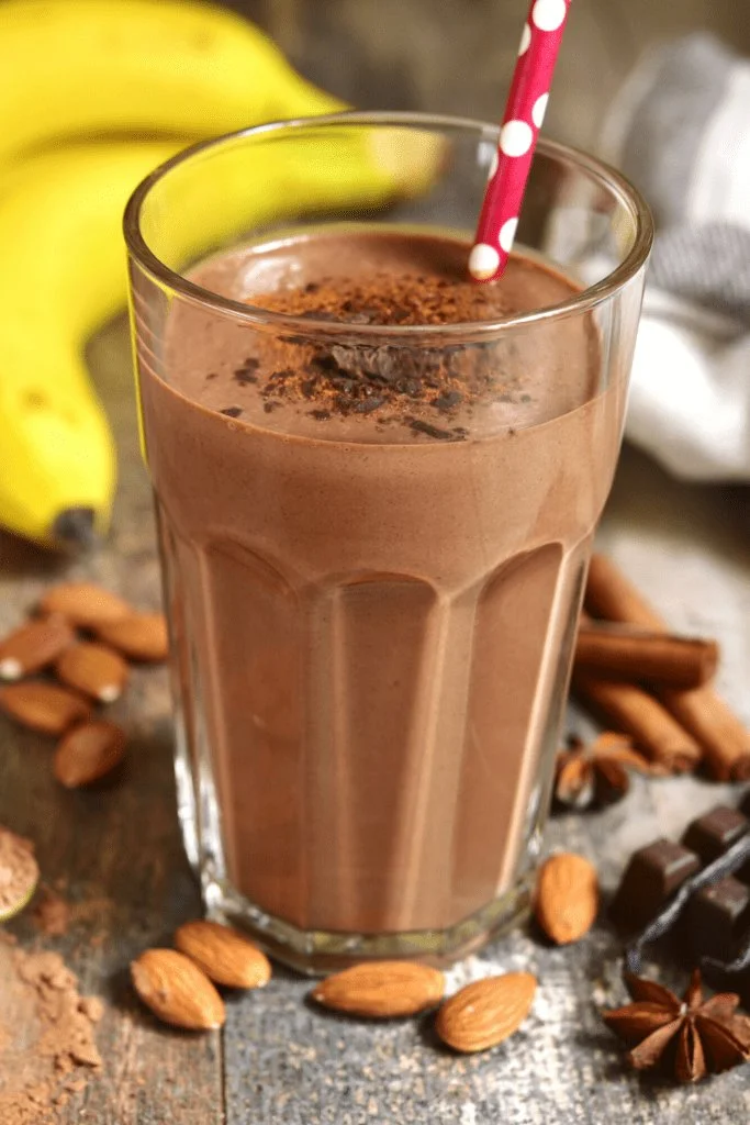 Peanut Power Plus Chocolate Smoothie ingredients blended together in a glass