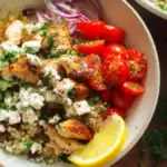 Delicious Greek Chicken Bowls with fresh vegetables and flavorful seasonings