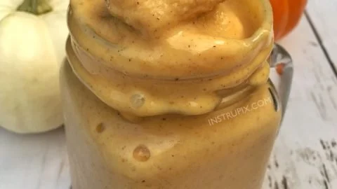 Delicious pumpkin pie smoothie topped with whipped cream and cinnamon